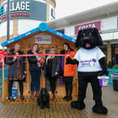 (L to R) Di Mellis, centre manager at Lakeside Village, Sarah Fenech holding Angel, George the spaniel support dog for Bluebell Wood, Lyndsey Parry, deputy centre manager at Lakeside Village, Eleanor Hughes from Bluebell Wood and Bluebell Wood’s mascot, George