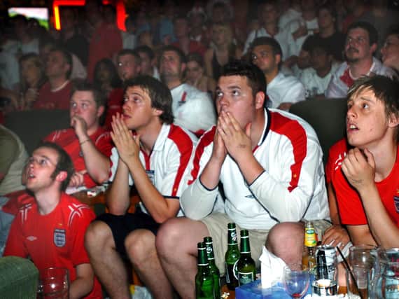 footballjr, England fans watching last nights game between England & France in the Old Monk  Pub, in Norfolk  Street, Sheffield City Centre