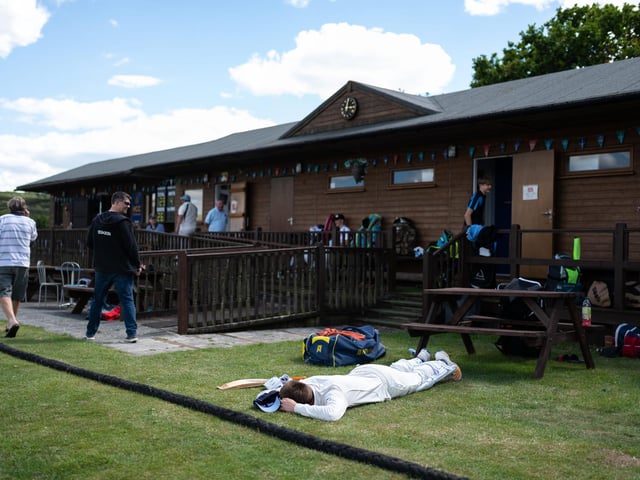 A Hambledon CC batsman lies dejected after being dismissed during recreational cricket's return at Ridge Meadow at the weekend. Pic: Jordan Pettitt/Solent News & Photo Agency