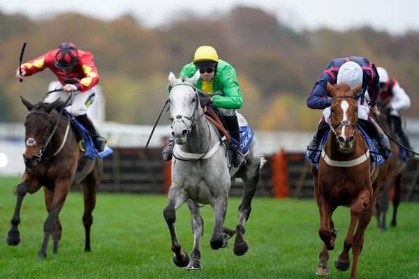 Nico de Boinville riding Buzz (green) clear to win The Coral Hurdle at Ascot last month. Photo by Alan Crowhurst/Getty Images