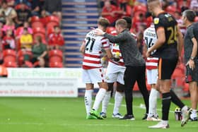 Gary McSheffrey gives instructions to Kyle Hurst in the win over Salford City.