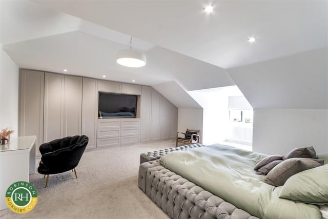 The principal bedroom has its own dressing room.