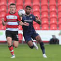 Owen Bailey in action for Doncaster Rovers.