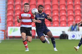 Owen Bailey in action for Doncaster Rovers.