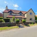 A front view of the stunning, larger style cottage for sale in Thorpe-in-Balne.