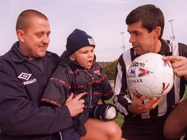 Kyle Barton checked out the match ball with ex Chesterfield player Ernie Moss before the charity game in his honour kicked off at Owlerton Stadium in 1997.