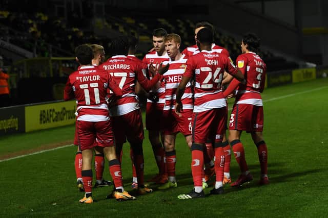 Doncaster Rovers' Taylor Richards celebrates with his team mates after scoring against Burton at the weekend