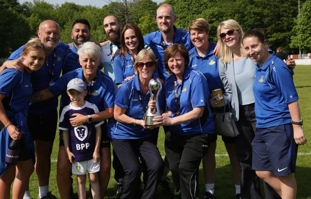Sheila Edmunds, left, and Julie Chipchase, right, proudly hold the trophy following Doncaster Rovers Belles' FAWSL2 title triumph in 2018. Photo: Julian Barker