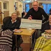 Rob presented the home with a cheque following the conclusion of the challenge. He is pictured with Colin Picken and Eddie Henshaw.