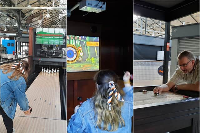 Free Press reporter Darren Burke and partner Giulia Savini try out the new gaming zone at the Wool Market.