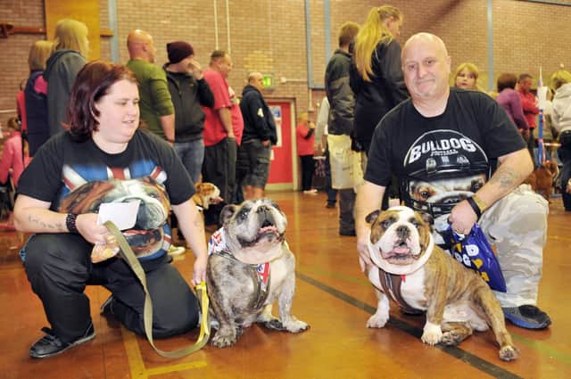 Bulldog Day at Rossmere. Owners Michelle and Nigel Holmes with their bulldogs Winston (left) and Cooper.