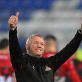 Doncaster's manager Grant McCann celebrates after the final whistle at Tranmere.