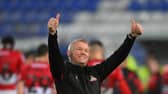Doncaster's manager Grant McCann celebrates after the final whistle at Tranmere.