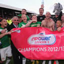 Doncaster Rovers' players celebrate winning the League One title at Griffin Park on April 27, 2013 (photo by Mike Hewitt/Getty Images).