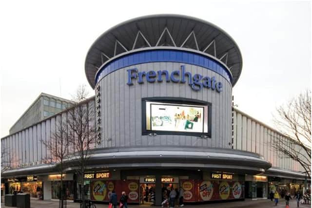 A 13-year-old girl was threatened with a knife in the Frenchgate Centre.