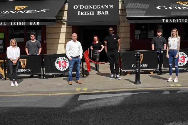 Chris Coughlan, O'Donegan's owner and Ian Bailey, Mason Arms owner, pictured with staff members. Picture: NDFP-30-03-21-O'Donegan's 1-NMSY