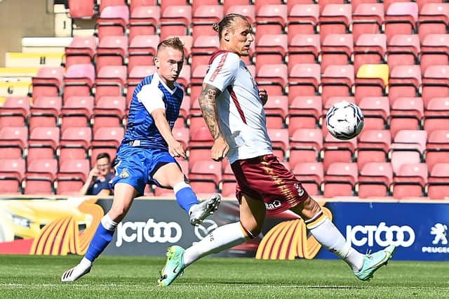 Trialist Louis Reed fires on goal for Rovers against Bradford City. Picture: Howard Roe/AHPIX
