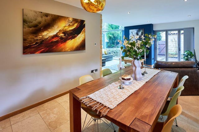 The kitchen extends to this open plan dining area.