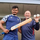 Knights player Haliq Holden and new Phoenix president Paul Curzon.