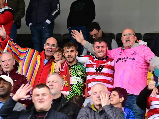 Rob Street hit a first-half brace to secure the League Two title for Doncaster Rovers on the final day of the season to the delight of these fans.