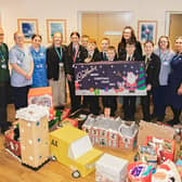 St John’s Hospice staff are pictured receiving the Christmas hampers from staff and students from Sir Thomas Wharton Academy.