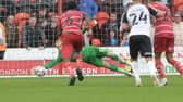 Pontus Dahlberg saves Shaun Williams' penalty against Portsmouth. Picture: Howard Roe/AHPIX