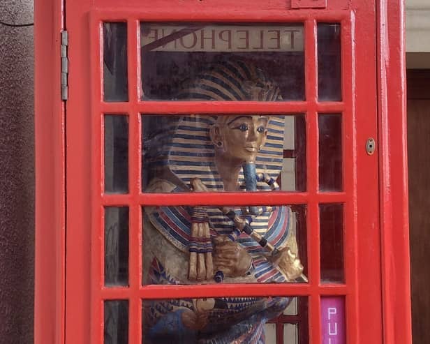 Tut-ally amazing: King Tut sarcophagus replica in the phone box 'mini museum'