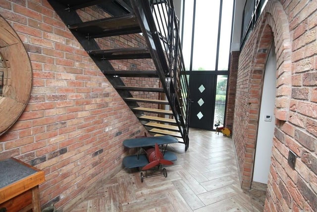 The property's bespoke open plan staircase.