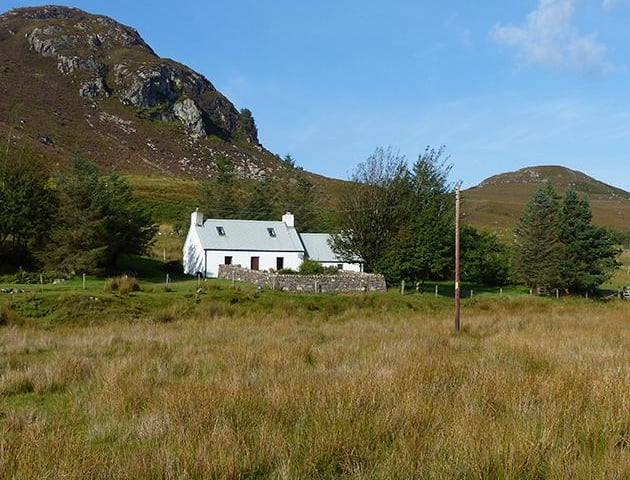An idyllic stone-built detached holiday cottage situated in a tranquil rural location with views over the open countryside and Loch Ewe beyond in the North-west coast of the Highlands of Scotland. This cottage has charm and character with traditional internal wooden doors, wood panelling to the walls and ceilings and it has a wood burning stove in the kitchen. Currently on sale for 145,000 GBP via Harper Macleod