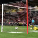 Charlie Kirk scores the winning penalty for Crewe.