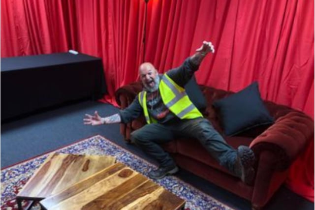 Nidge takes a breather after helping to construct The Killers' dressing rooms.