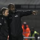 Darren Moore speaks to assistant Jamie Smith at Northampton. Picture: Howard Roe/AHPIX