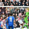 Jonathan Mitchell punches away but moments later Grimsby equalised. Picture: Howard Roe/AHPIX LTD