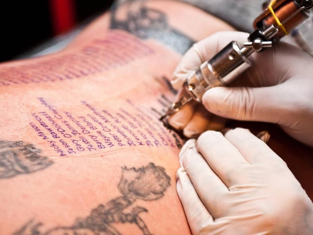 Former soldier Shaun Clark, aged 43, has the names of every British soldier killed in Afghanistan tattooed on his back at the Fantasy Tattoo Studio in Doncaster. Tattooist Kevin Kent is provided his services for free, and Shaun hopes to raise £500 for forces' charities;