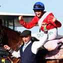 Jockey Rachael Blackmore celebrates on A Plus Tard after winning the Cheltenham Gold Cup. Photo by ADRIAN DENNIS/AFP via Getty Images