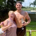 Joe Vaughan is pictured with his mum Jane after completing his half-marathon.