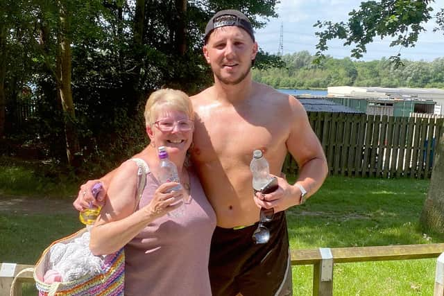 Joe Vaughan is pictured with his mum Jane after completing his half-marathon.