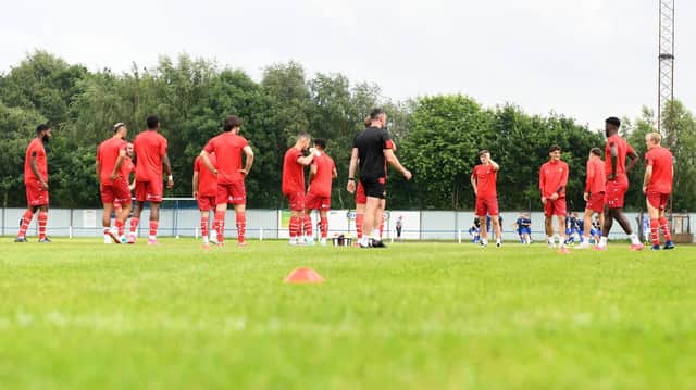 The Rovers squad warms up proper to the friendly with Rossington Main at Oxford Street. Picture: Andrew Roe/AHPIX