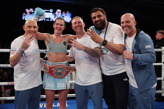 Terri Harper celebrates with her team including Stefy Bull and Ryan Rhodes, right. Picture: Mark Robinson/Matchroom Boxing