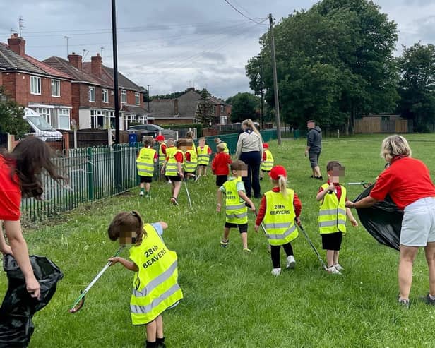 Squirrel Scouts doing a litter pick