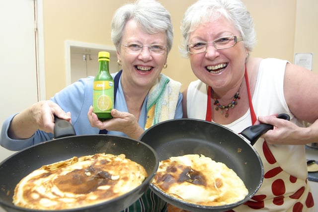 Elaine Grout and Chris Wright. at a pancake night in Wood Street Methodist Church, Ripley, to raise money for the chapel funds in 2007.