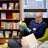 DBTH colleagues reading in the leisure library.