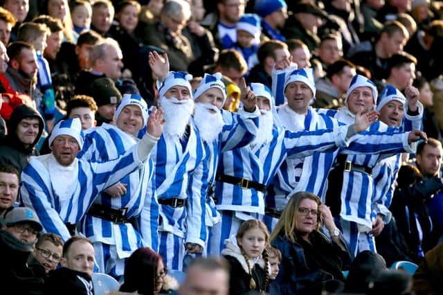 Wednesday fans get into the festive spirit during the Sky Bet Championship game with Bristol City at Hillsborough in December 2019.