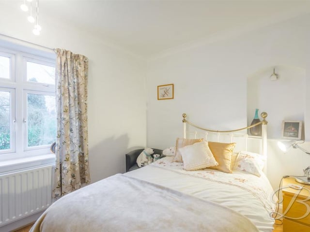 The fourth and final bedroom is smaller than the rest, but it is still smart and bright, with its window facing the side of the house.