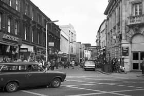 Both St Sepulchre Gate and Baxtergate were open to vehicles when this photo was taken in 1976. Ratners, the jewellery chain is at Clock Corner