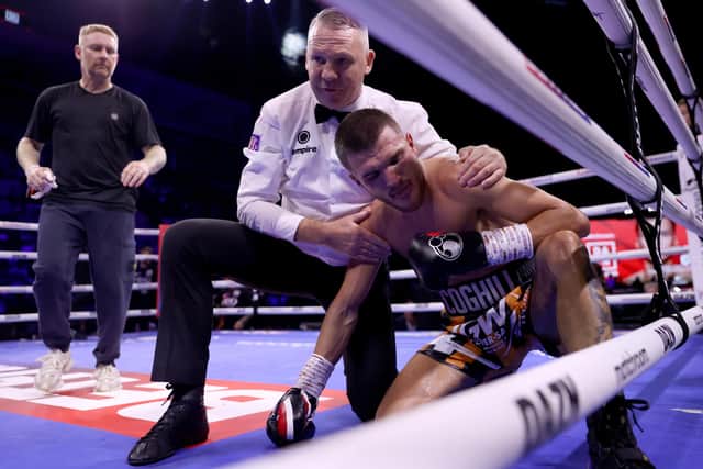 SHEFFIELD, ENGLAND - OCTOBER 07: Connor Coghill reacts after being defeated by Hopey Price during the Featherweight fight between Hopey Price and Connor Coghill at Utilita Arena Sheffield on October 07, 2023 in Sheffield, England. (Photo by James Chance/Getty Images)