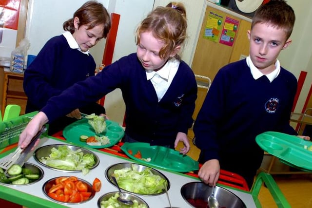 Pupils at St Joseph and St Teresa's RC Primary School in Woodlands, October 2006. Trying out the new salad bar.