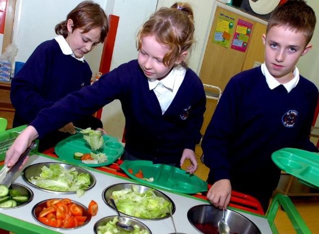 Pupils at St Joseph and St Teresa's RC Primary School in Woodlands, October 2006. Trying out the new salad bar.