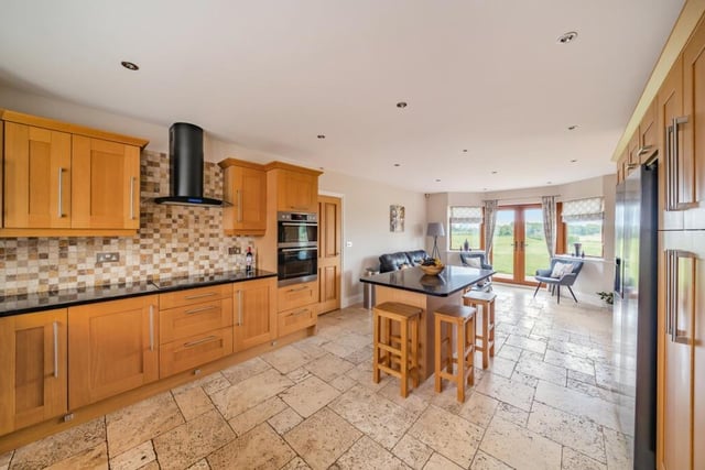 The open plan kitchen with breakfast room.