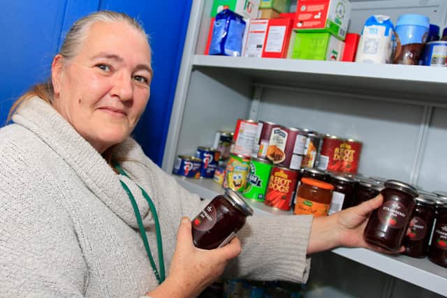 Volunteer Carol Corner, pictured in the Food Store.